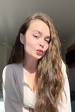 Ukrainian mail order bride Valeria from Kyiv with light brown hair and green eye color - image 9