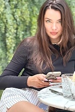 Ukrainian mail order bride Yevheniia from New York with brunette hair and blue eye color - image 8