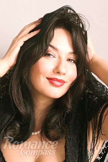 Ukrainian mail order bride Hanna from Kaunas with black hair and brown eye color - image 1