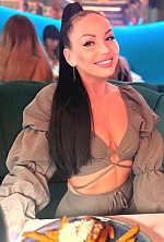 Ukrainian mail order bride Kateryna from Warsaw with black hair and blue eye color - image 11