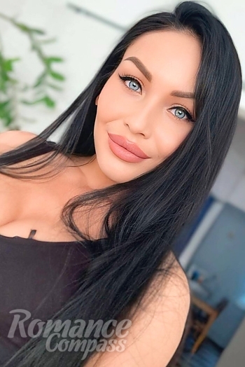 Ukrainian mail order bride Kateryna from Warsaw with black hair and blue eye color - image 1