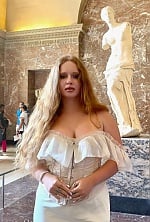 Ukrainian mail order bride Diana from Kyiv with red hair and blue eye color - image 12