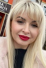 Ukrainian mail order bride Nataliia from Rivne with blonde hair and green eye color - image 10