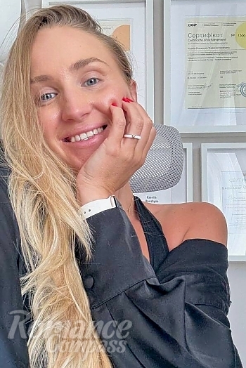 Ukrainian mail order bride Kseniia from Kyiv with blonde hair and blue eye color - image 1