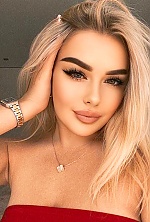 Ukrainian mail order bride Ruslana from Vinnytsia with blonde hair and grey eye color - image 12