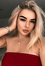 Ukrainian mail order bride Ruslana from Vinnytsia with blonde hair and grey eye color - image 7