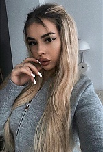 Ukrainian mail order bride Ruslana from Vinnytsia with blonde hair and grey eye color - image 5