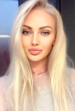 Ukrainian mail order bride Victoria from Vienna with blonde hair and blue eye color - image 2