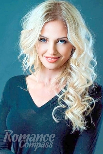 Ukrainian mail order bride Victoria from Vienna with blonde hair and blue eye color - image 1