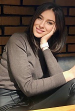 Ukrainian mail order bride Olena from Zhytomyr with brunette hair and green eye color - image 8