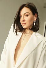 Ukrainian mail order bride Olena from Zhytomyr with brunette hair and green eye color - image 5