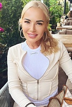 Ukrainian mail order bride Vita from Kyiv with blonde hair and green eye color - image 11