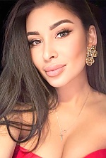 Ukrainian mail order bride Lamia from Kyiv with black hair and black eye color - image 4