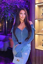 Ukrainian mail order bride Lamia from Kyiv with black hair and black eye color - image 7