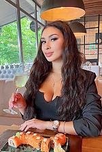 Ukrainian mail order bride Lamia from Kyiv with black hair and black eye color - image 8