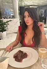 Ukrainian mail order bride Lamia from Kyiv with black hair and black eye color - image 12