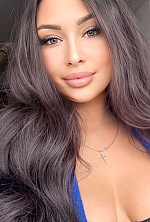 Ukrainian mail order bride Lamia from Kyiv with black hair and black eye color - image 9