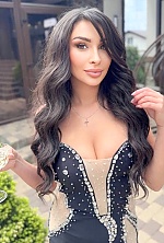 Ukrainian mail order bride Lamia from Kyiv with black hair and black eye color - image 5