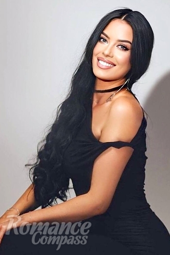 Ukrainian mail order bride Neonila from Kyiv with black hair and green eye color - image 1