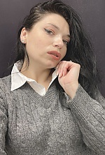 Ukrainian mail order bride Alina from Dubno with black hair and green eye color - image 9