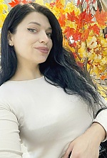 Ukrainian mail order bride Alina from Dubno with black hair and green eye color - image 3