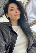 Ukrainian mail order bride Alina from Dubno with black hair and green eye color - image 7