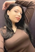 Ukrainian mail order bride Alina from Dubno with black hair and green eye color - image 10