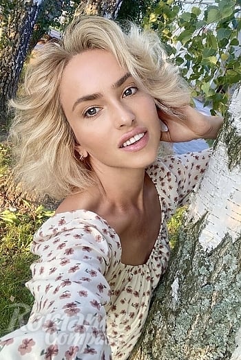 Ukrainian mail order bride Svetlana from Kyiv with blonde hair and grey eye color - image 1