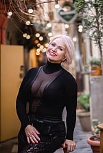 Ukrainian mail order bride Nataliia from Kyiv with blonde hair and hazel eye color - image 11