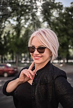 Ukrainian mail order bride Nataliia from Kyiv with blonde hair and hazel eye color - image 9