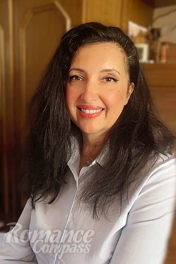 Ukrainian mail order bride Ilona from Kyiv with black hair and brown eye color - image 1