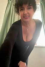 Ukrainian mail order bride Ilona from Kyiv with black hair and brown eye color - image 12