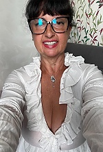 Ukrainian mail order bride Ilona from Kyiv with black hair and brown eye color - image 13