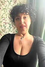 Ukrainian mail order bride Ilona from Kyiv with black hair and brown eye color - image 14