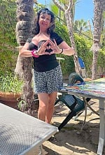 Ukrainian mail order bride Ilona from Kyiv with black hair and brown eye color - image 4