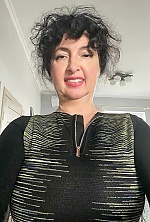 Ukrainian mail order bride Ilona from Kyiv with black hair and brown eye color - image 11