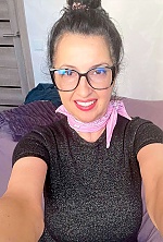 Ukrainian mail order bride Ilona from Kyiv with black hair and brown eye color - image 6