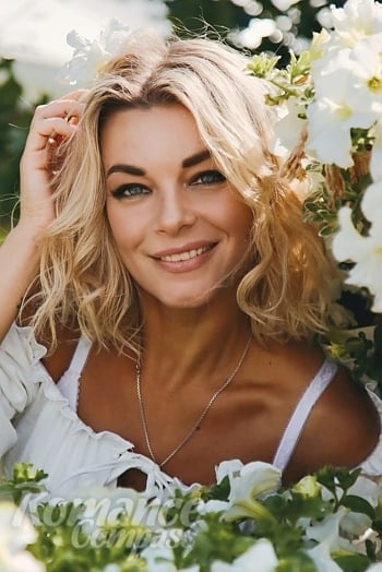 Ukrainian mail order bride Juliya from Odesa with blonde hair and blue eye color - image 1