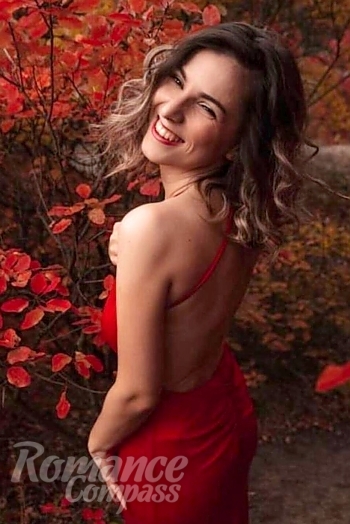 Ukrainian mail order bride Ksenia from Prague with light brown hair and green eye color - image 1