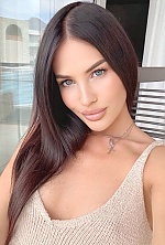 Ukrainian mail order bride Yana from Bucharest with brunette hair and hazel eye color - image 4