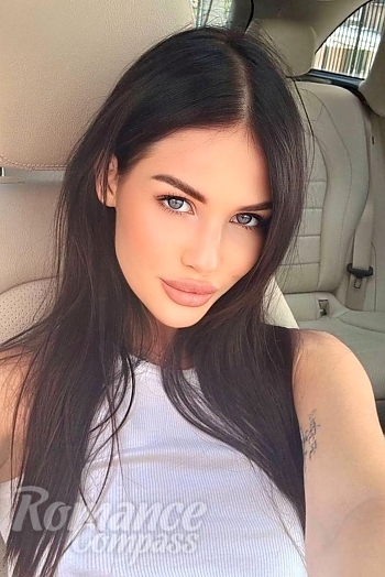 Ukrainian mail order bride Yana from Bucharest with brunette hair and hazel eye color - image 1