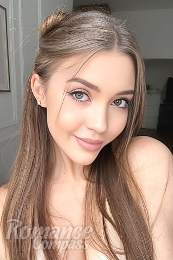 Ukrainian mail order bride Anna from Kyiv with light brown hair and green eye color - image 1