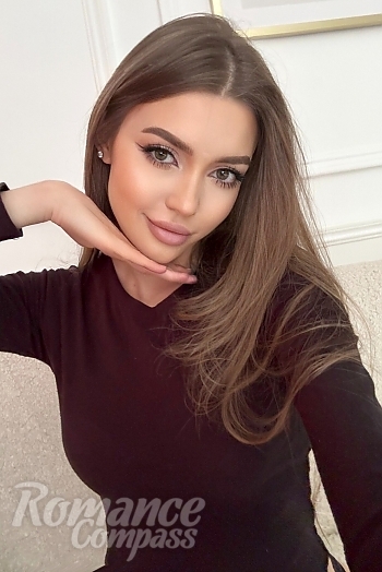 Ukrainian mail order bride Anna from Kyiv with light brown hair and green eye color - image 1