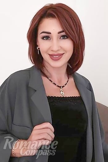 Ukrainian mail order bride Tetiana from Odesa with auburn hair and grey eye color - image 1