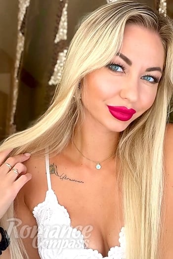 Ukrainian mail order bride Viktoriia from Sumy with blonde hair and blue eye color - image 1