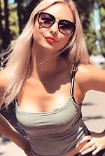 Ukrainian mail order bride Viktoriia from Sumy with blonde hair and blue eye color - image 41