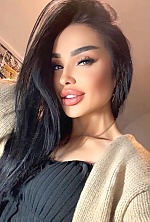 Ukrainian mail order bride Olena from Berlin with black hair and hazel eye color - image 2