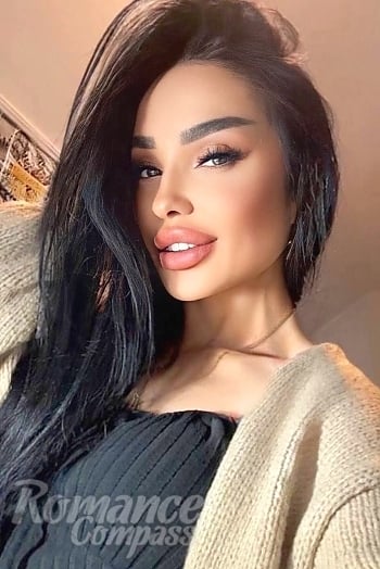 Ukrainian mail order bride Olena from Berlin with black hair and hazel eye color - image 1