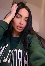 Ukrainian mail order bride Olena from Berlin with black hair and hazel eye color - image 10