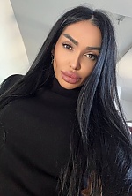 Ukrainian mail order bride Olena from Berlin with black hair and hazel eye color - image 9